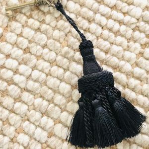 French tassels… key not included
